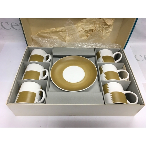 1385 - A boxed mid 20th Century Susie Cooper coffee set.