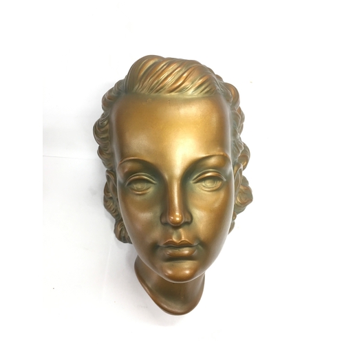 1386 - A mid 20th Century terracotta wall mask of a young lady, approx height 23cm.