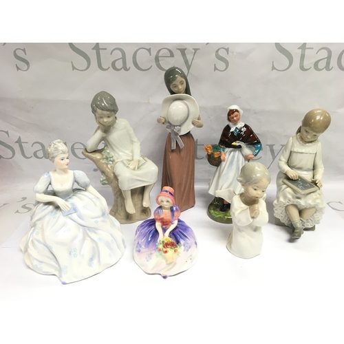 1388 - A collection of Lladro, Doulton, Nao and Coalport figures (7).