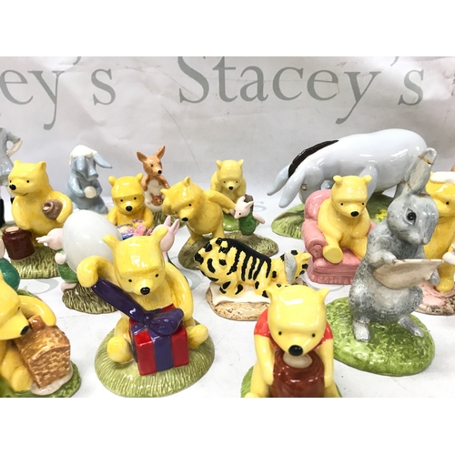 1268 - A Collection of Royal Doulton Disney porcelain Winnie the Pooh figures