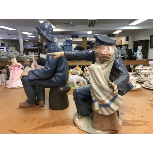 1282 - Two large Lladro figures of Fishermen. Largest one 39cm in height approximately