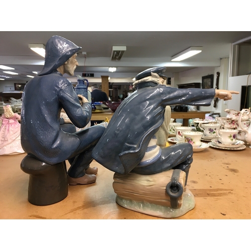1282 - Two large Lladro figures of Fishermen. Largest one 39cm in height approximately