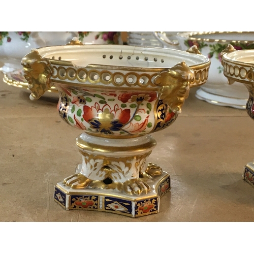 1286 - A pair of Royal Crown Derby Pot pourri vessels , in the Imari pattern, without lids- some damage