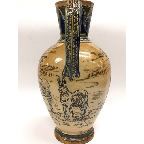 1291 - HannahÍs Barlow stoneware jug decorated with donkeys. 25cm tall. No obvious damage or restoration