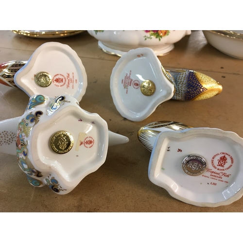 1296 - Four Royal Crown Derby paperweights in the form of marine animals including Dolphin, all with stoppe... 