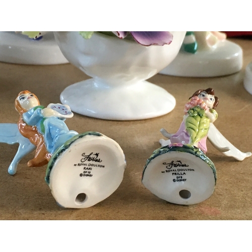 1304 - Four Royal Doulton lady figures in Art Deco style dress, together with other lady figures and two mi... 