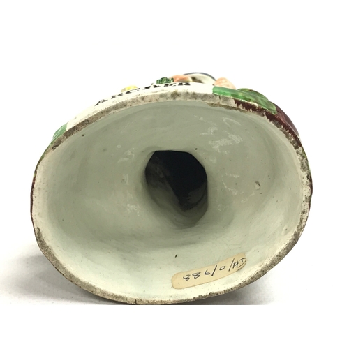 1306 - An early 19th century Archer Pearl ware figure (some damage )