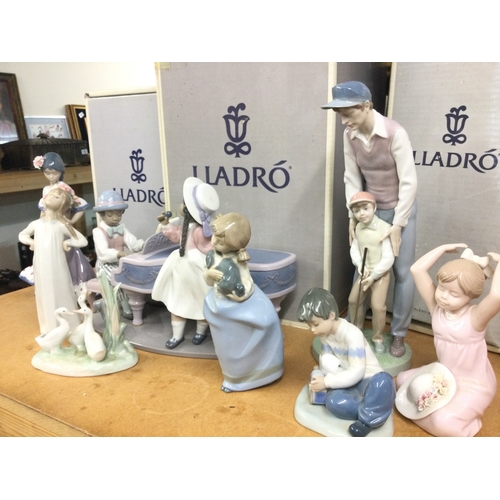 1321 - A collection of boxed Lladro and Nao porcelain figures including Jazz Duo, Flor Maria, like father l... 