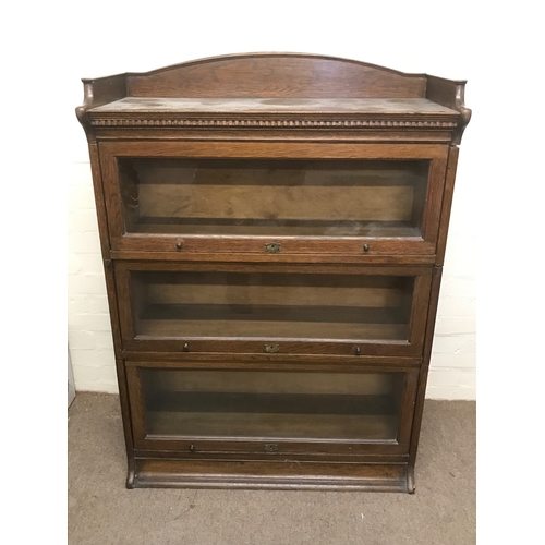 1859 - An oak globe wernick bookcase. 88cm wide, 124cm tall , 36cm long