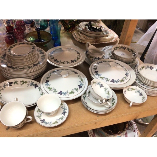1002 - A Royal Doulton Porcelain dinner service The Burgundy pattern. Comprising tureens cups sauces soup b... 