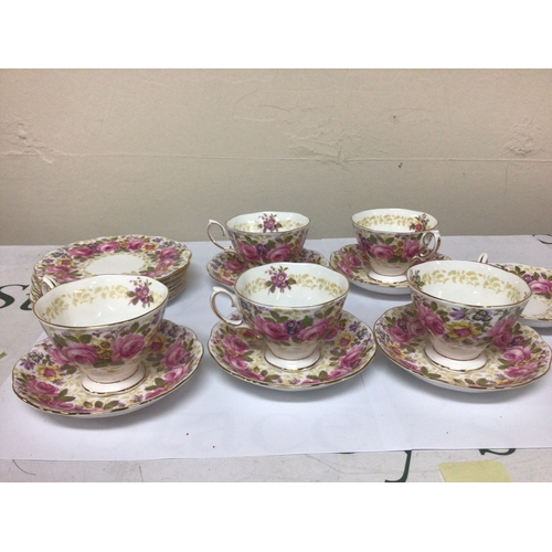 1125 - A Royal Albert English bone china tea set The Serena pattern with a perfusion of flowers five cups s... 