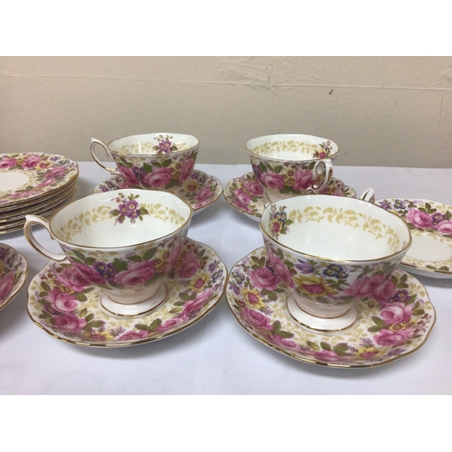 1125 - A Royal Albert English bone china tea set The Serena pattern with a perfusion of flowers five cups s... 