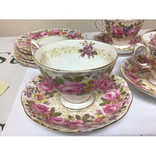 1125 - A Royal Albert English bone china tea set The Serena pattern with a perfusion of flowers five cups s... 
