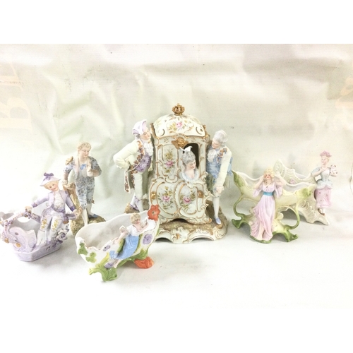1128 - A collection of bisque figures, tallest 22cm