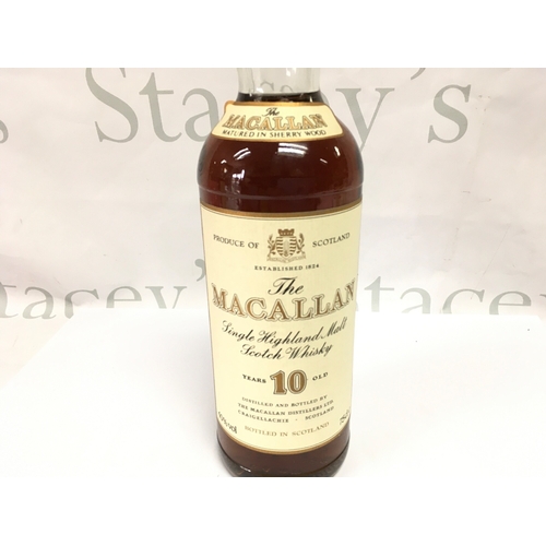 852 - A vintage bottle of Macallan 10 year old whisky 75cl. Sealed with good level.