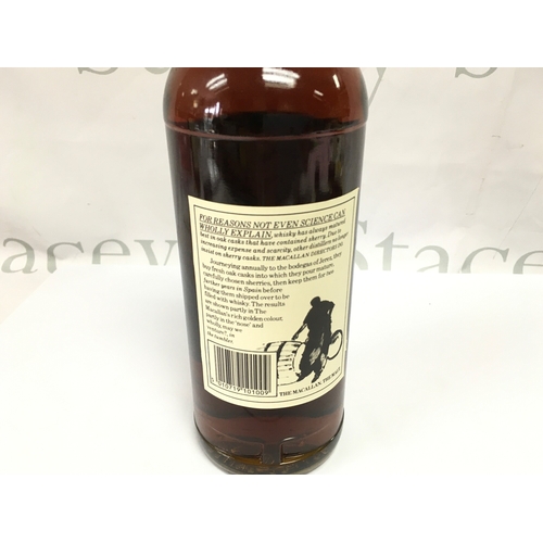 852 - A vintage bottle of Macallan 10 year old whisky 75cl. Sealed with good level.