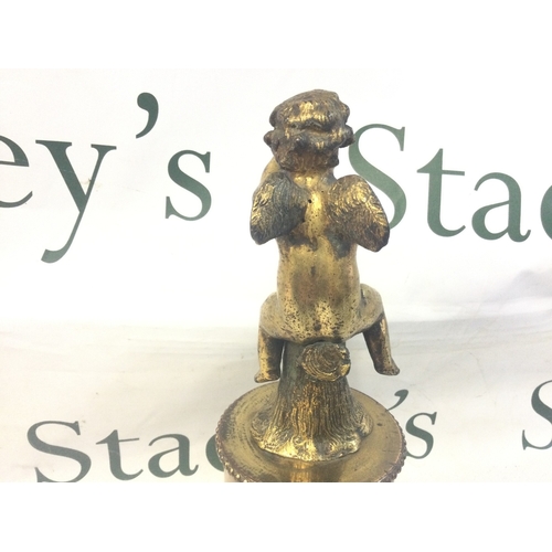 853 - A gilt mounted putti on a marble base, 28cm tall