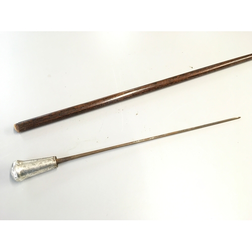857 - A sword stick, 84cm long, sword 50cm long