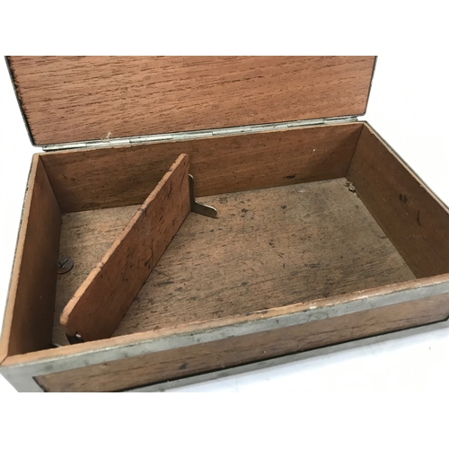 865 - A Silver-plated cigar box featuring a hunting scene painting under glass on the lid. Dimensions 23.5... 