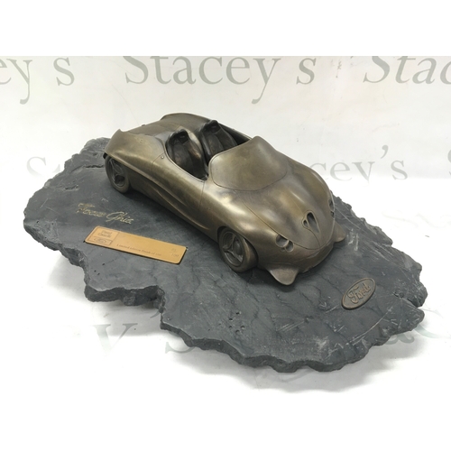 869 - A limited edition sculpture model of the 1992 Ford Ghia Focus concept car. 23/100. 42cm long, 30cm w... 