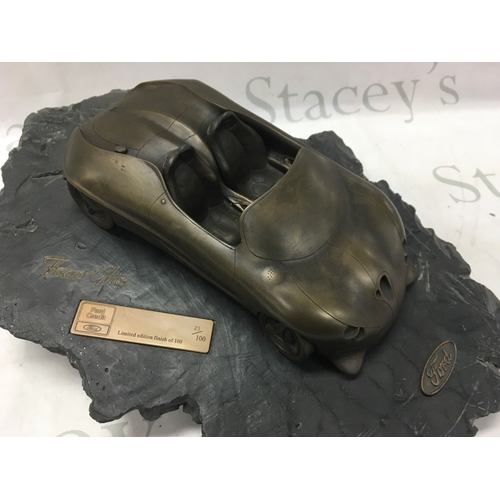 869 - A limited edition sculpture model of the 1992 Ford Ghia Focus concept car. 23/100. 42cm long, 30cm w... 