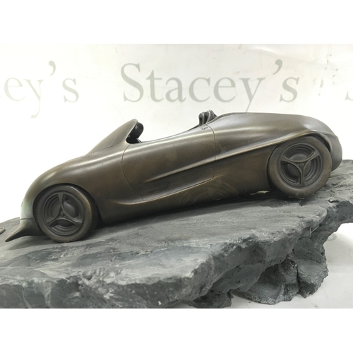 869 - A limited edition sculpture model of the 1992 Ford Ghia Focus concept car. 23/100. 42cm long, 30cm w... 
