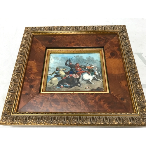873 - An 18th century miniature depicting a cavalry battle scene, framed later. Frame size 18x16cm. Pictur... 