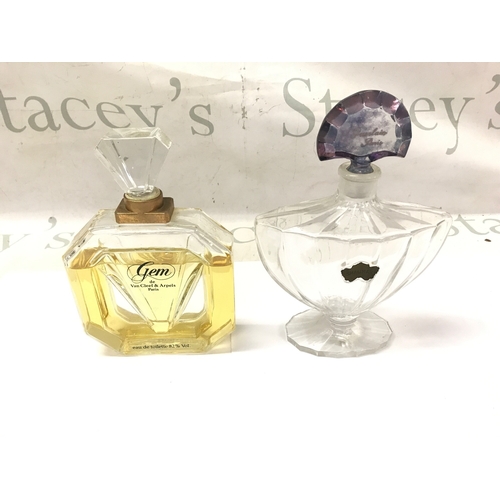 874 - Two perfume bottles including baccarat. 20cm by 15cm wide. NO RESERVE