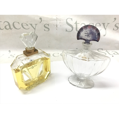 874 - Two perfume bottles including baccarat. 20cm by 15cm wide. NO RESERVE