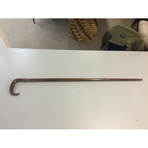 875 - A sword stick with crook handle . 85cm long , sword 35cm long