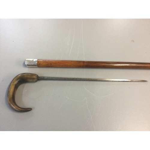 877 - A sword stick. Blade 30cm total length 88cm