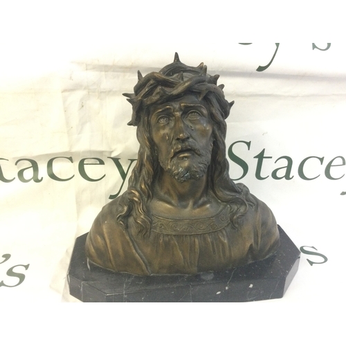 879 - A Oscar Ruffony bronze bust of Christ, 25cm tall ,26cm wide .