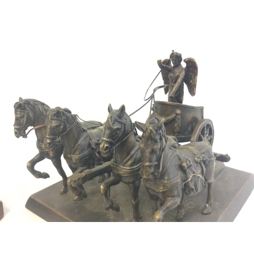 881 - A Franklin Mint Roman Chariot figure and a Joan of Arc spelter figure 19 and 14cm tall