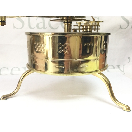 883 - An Eaglemoss sun/moon/earth orbiter electric clock tellurium. 34cm tall