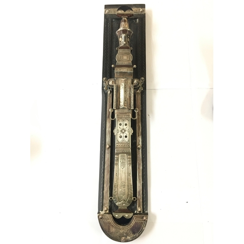 891 - A East African Ceremonial Dagger In Silver Scabbed.