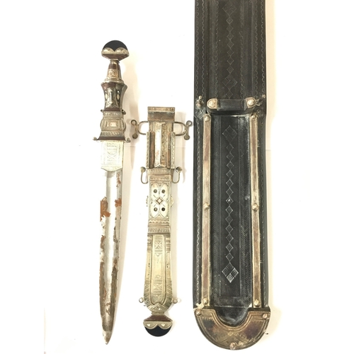 891 - A East African Ceremonial Dagger In Silver Scabbed.