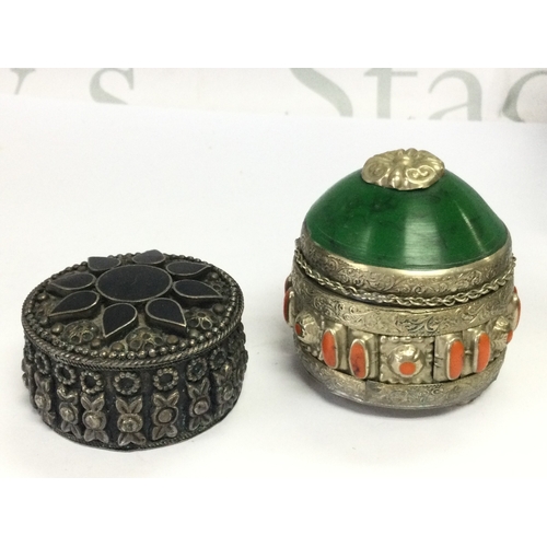893 - Two nickel silver or alpaca silver 800 snuff/ perfume / trinket boxes. 65mm high box with green ston... 