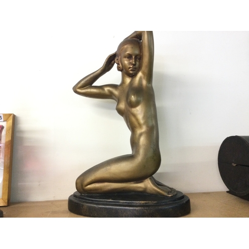 901 - An Art Deco bronze effect plaster figure of a nude lady