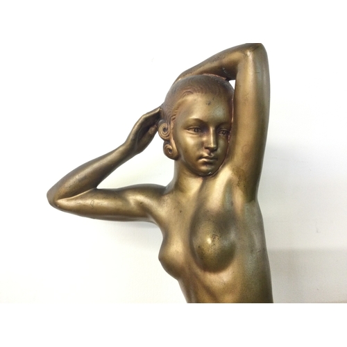 901 - An Art Deco bronze effect plaster figure of a nude lady