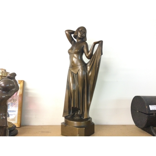 902 - A British made Art Deco bronze effect plaster figure of a lady