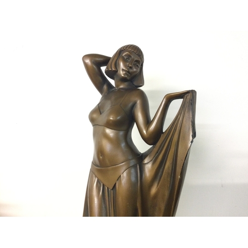 902 - A British made Art Deco bronze effect plaster figure of a lady