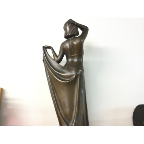 902 - A British made Art Deco bronze effect plaster figure of a lady