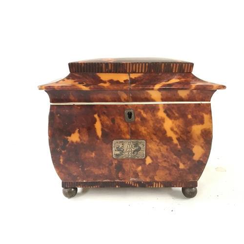 910 - A tortoiseshell tea caddy 18cm wide 16cm tall 12cm long