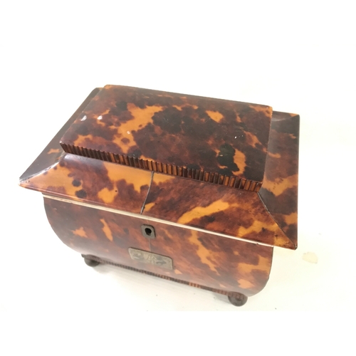 910 - A tortoiseshell tea caddy 18cm wide 16cm tall 12cm long