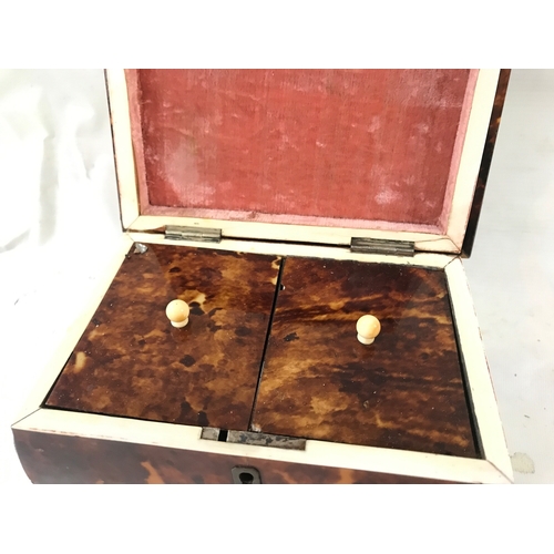 910 - A tortoiseshell tea caddy 18cm wide 16cm tall 12cm long