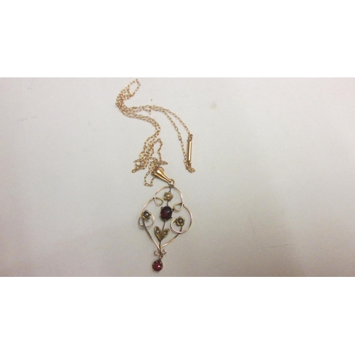 11 - 9 ct gold necklace set with seed pearls and garnets on 9 ct gold chain in a presentation case