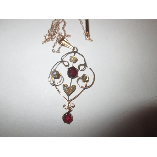 11 - 9 ct gold necklace set with seed pearls and garnets on 9 ct gold chain in a presentation case