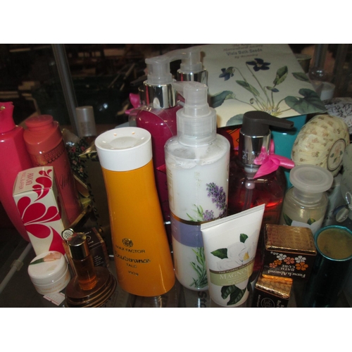 58 - 3 x shelves of assorted perfumes, shampoo, & toiletries