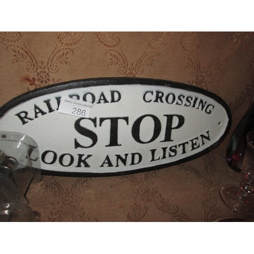 278 - Cast iron sign : Stop, Look, Listen