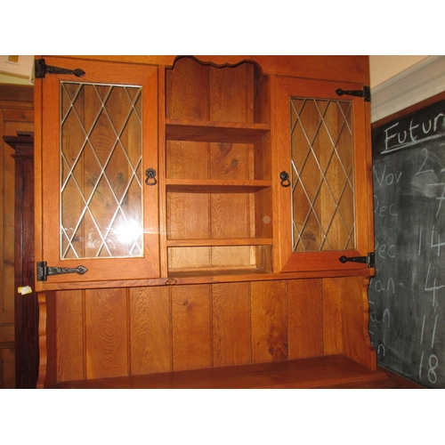 582 - 20th century glazed oak dresser